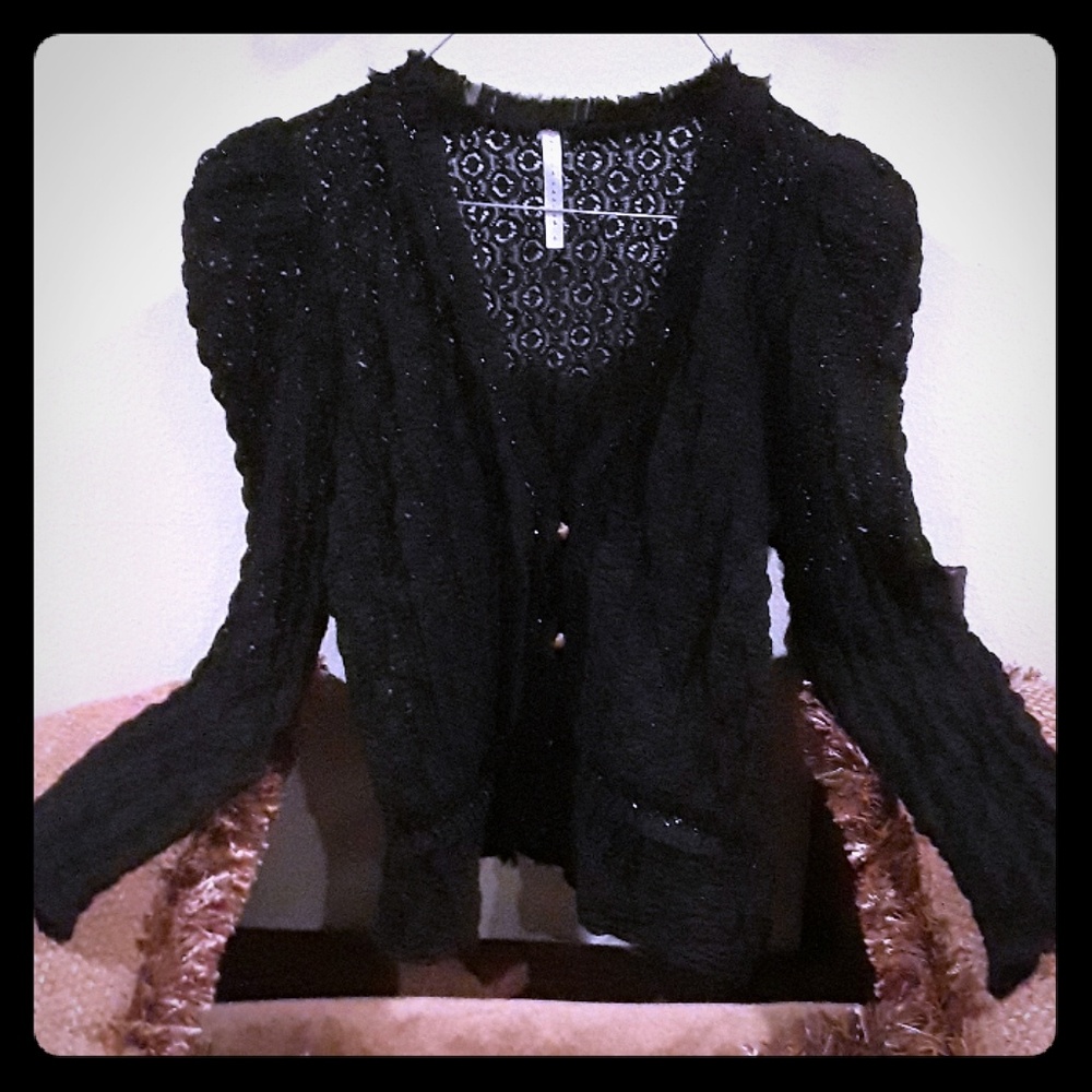 Black sweater with glitter trimming